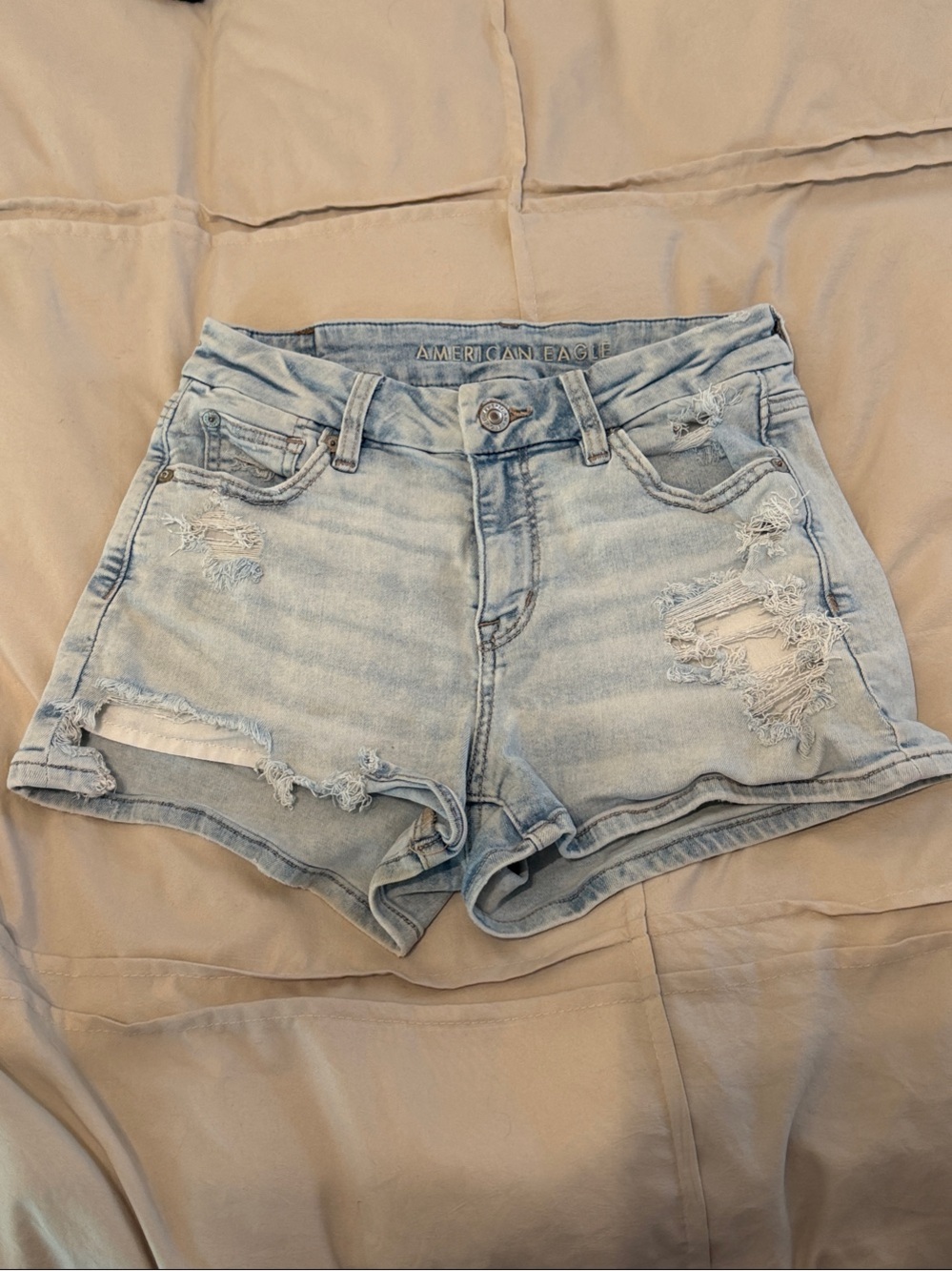 American Eagle Outfitters Light Wash Ripped High-Rise Denim Shorts
